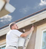 professional-painter-using-a-small-roller-to-paint-2022-10-17-01-15-21-utc-4010416